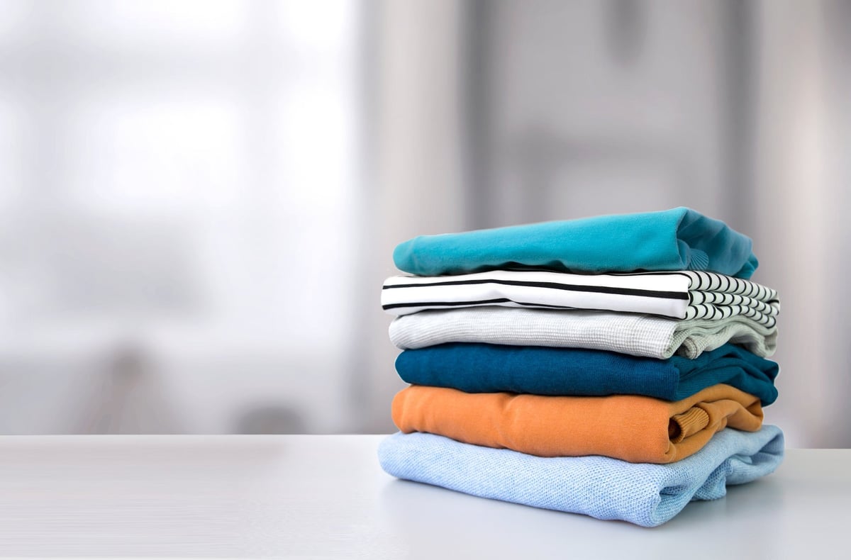 Pile of colorful clothing on a table